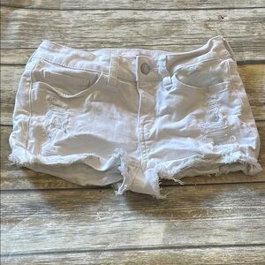 SIZE 3 WHITE DENIM SO JEAN SHORTS 
FACTOR FREYED AND RIPS